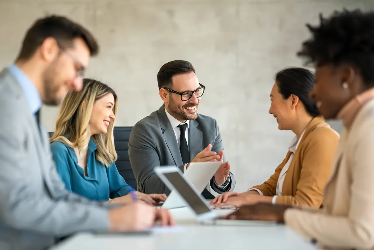 A team of local professionals reviewing a client project